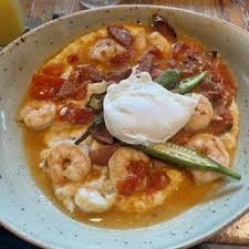 West Egg Cafe signature dishes Fried Green Tomato BLT
Shrimp and Grits
Banana Bread French Toast
